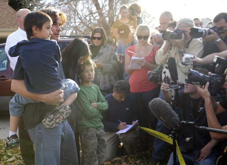 (cm) FALCON_CM 6-year-old Falcon Heene is home safe after it was thought he flew on a weather balloon that got loose. He was hiding the garage attic of his home in Fort Collins on Thursday October 15, 2009. Falcon is in his dad's arms Richard Heene, mom M