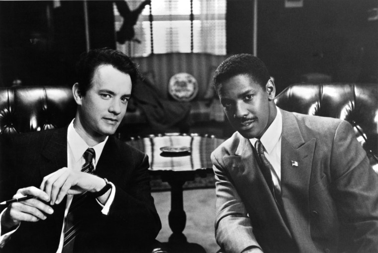 Image: Tom Hanks and Denzel Washington on the set of \"Philadelphia\" in 1993