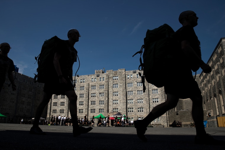 Image: New cadets march in a courtyard on campus at West Point