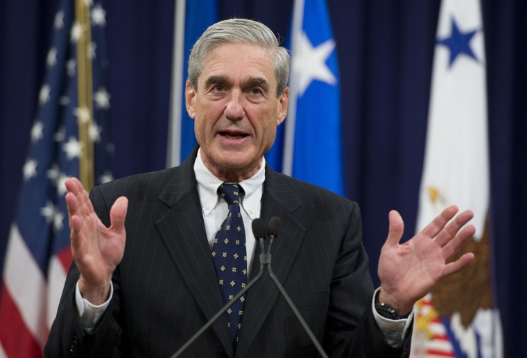 Image: Robert Mueller speaks during a farewell ceremony in his honor at the Department of Justice