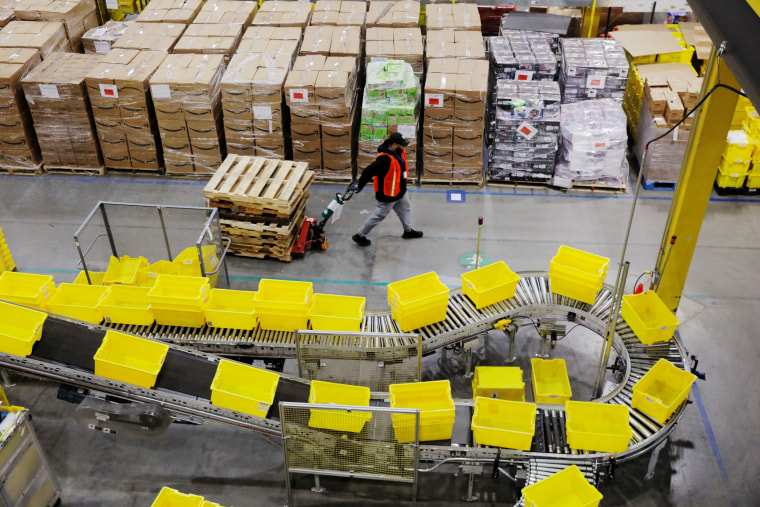 Amazon workers at an Amazon fulfillment center in Robbinsville, N.J., on Dec. 2, 2019.