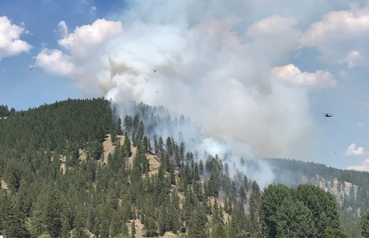 Firefighting helicopters respond to a fire near OU3 in Montana.