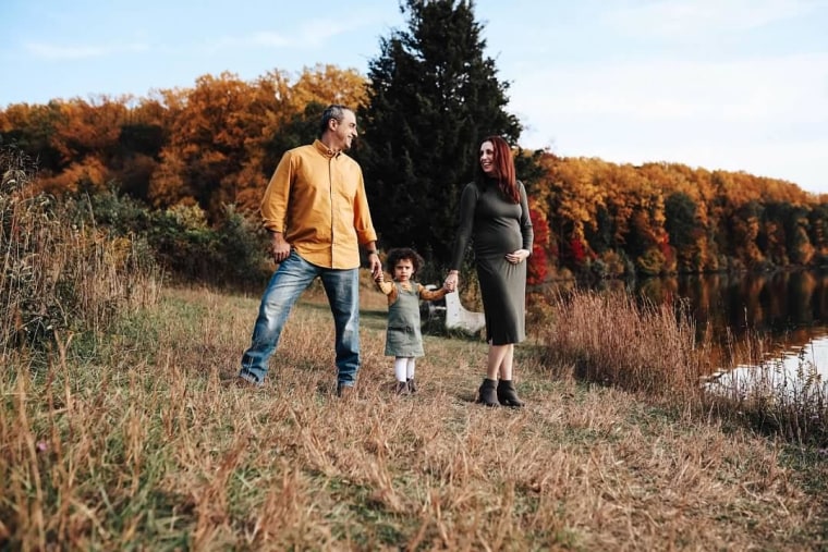 Katie Walker Heinin with husband Emile and daughter Hayden.