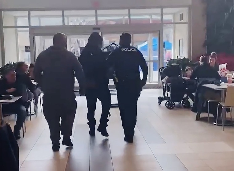 Police detain a Black man at a Virginia mall as he and his family were eating.