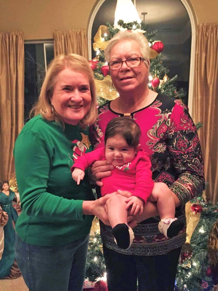 Rep. Sylvia Garcia, D-Texas, left, with one of the family's grandchildren and her late sister.