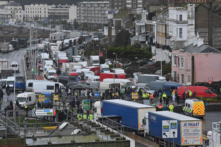 Image: Drivers and their vehicles queue trying to enter the port of Dover, in Kent, south east England