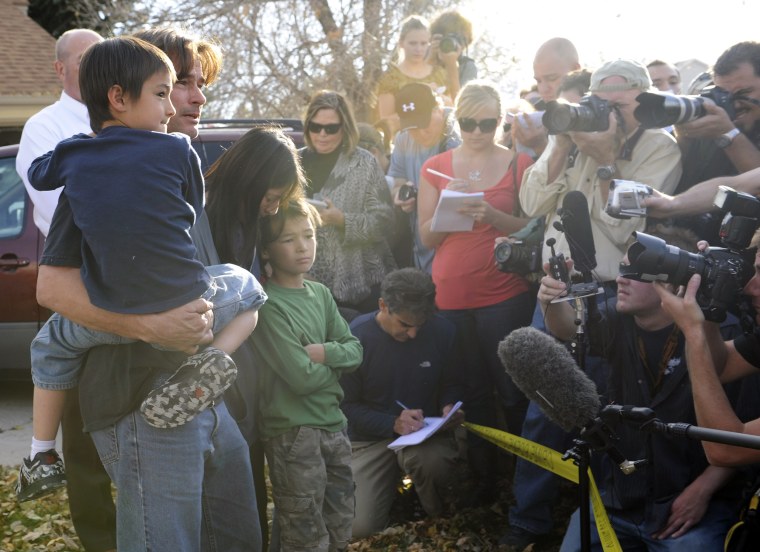 Image: Richard Heene holds his son Falcon Heene, 6.