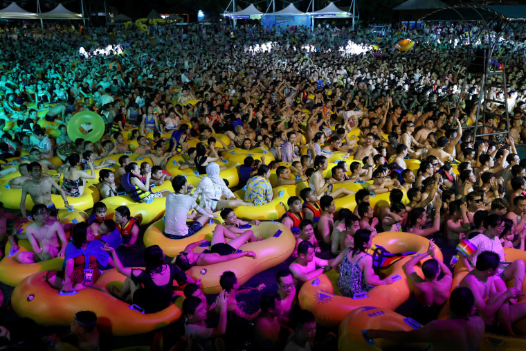 Image: People enjoy a music party inside a swimming pool at the Wuhan Maya Beach Park, in Wuhan, following the coronavirus disease (COVID-19) outbreak, Hubei province, China