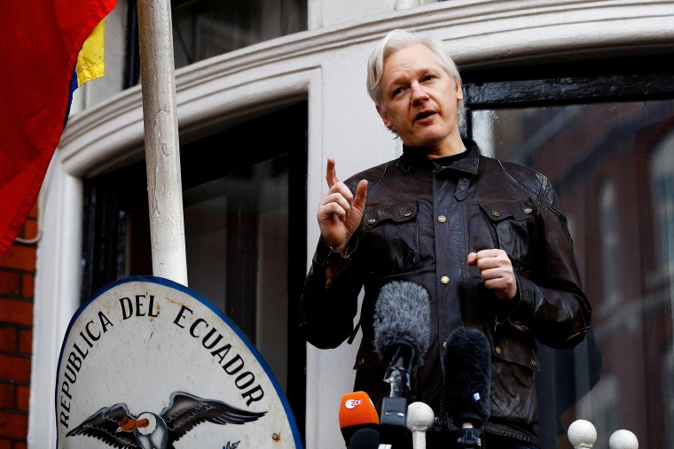 Image:  WikiLeaks founder Julian Assange speaks on the balcony of the Ecuadorian Embassy in London