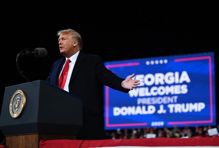 Image: President Donald Trump speaks at a rally to support Republican Senate candidates at Valdosta Regional Airport in Valdosta, Ga.
