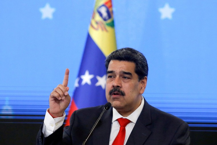 Image: Venezuelan President Nicolas Maduro gestures during a news conference in Caracas