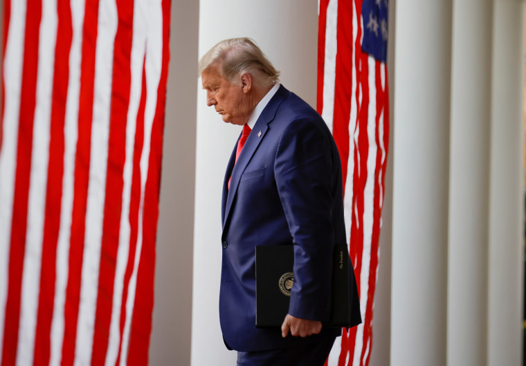 Image: President Donald Trump walks down the West Wing colonnade from the Oval Office to the Rose Garden.