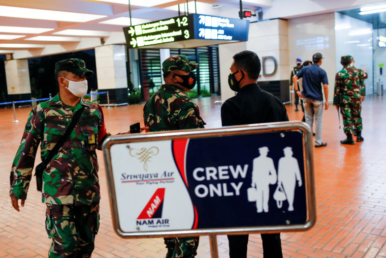 Image: Indonesian soldiers at Soekarno-Hatta International Airport in Tangerang