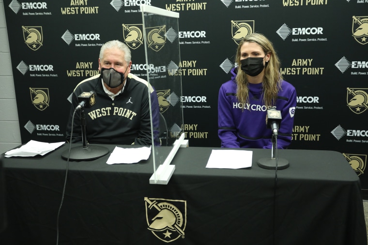Dave and Maureen Magarity speak to the media. The younger Magarity beat her father in both games their teams played.