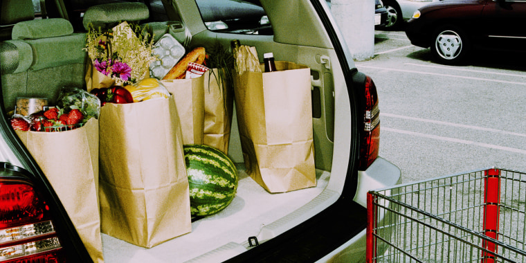 Groceries in back of car, parked in parking lot (Cross Processed)