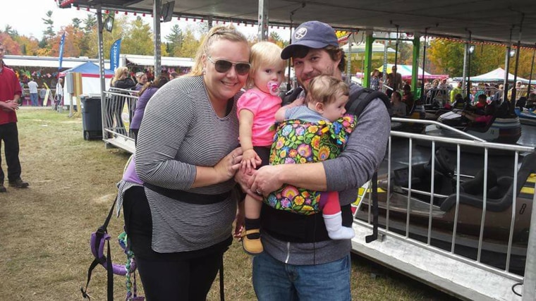 In this 2017 photo, Wawrzynski poses with her daughter Nadja, her husband Mark Johnson and daughter Thalia.