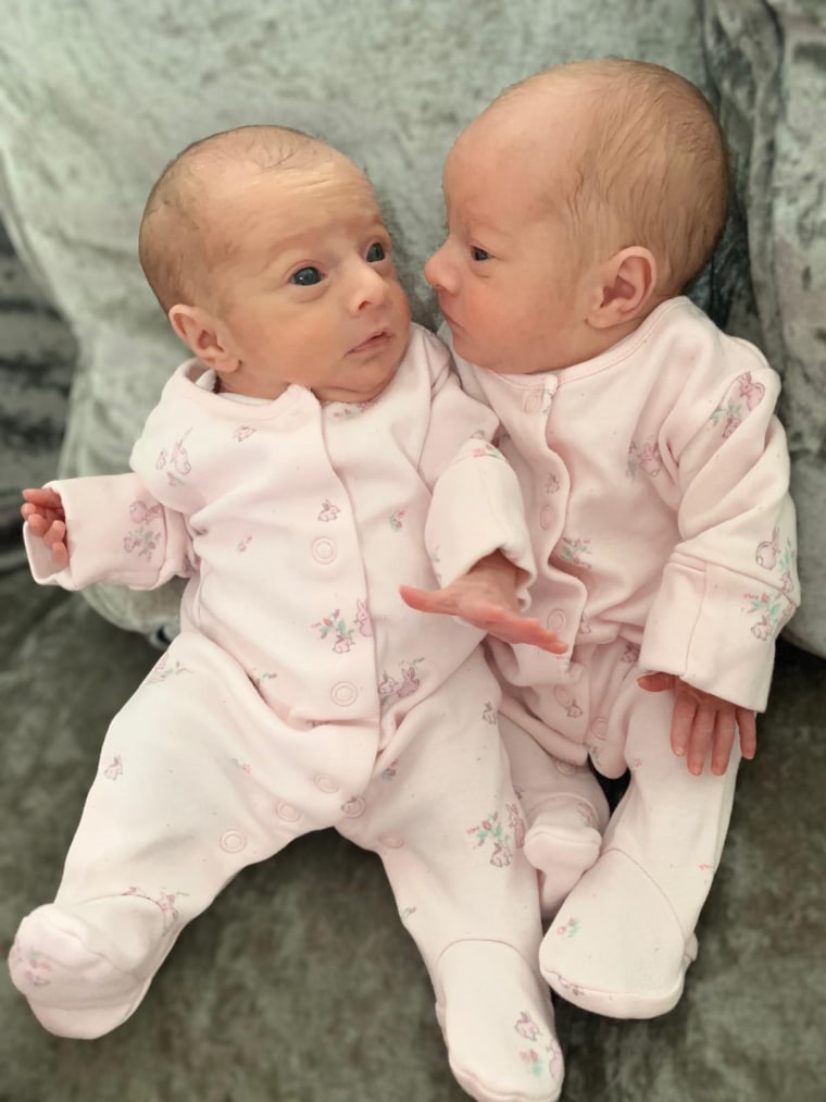 Twin sisters Aria and Skylar cuddled together tightly as they entered the world via C-section.