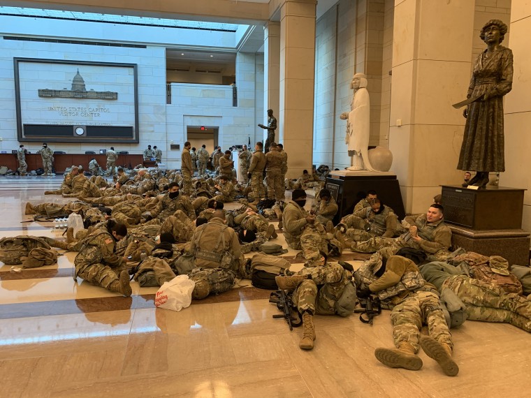 Members of National Guard sleep in Emancipation Hall 