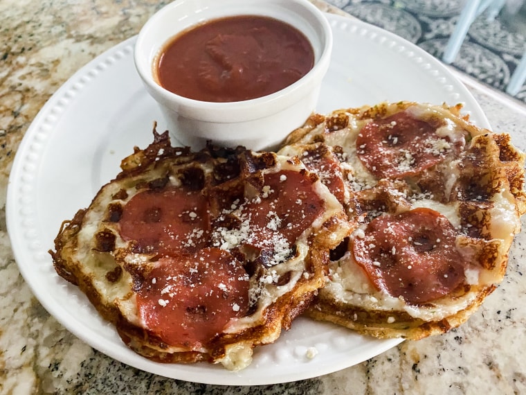 To make "pizza" chaffles, simply cook mozzarella cheese, pepperoni and Italian seasoning in your mini waffle maker.