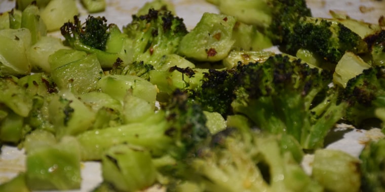 The key to getting any crispness to frozen broccoli is to roast it on high heat.