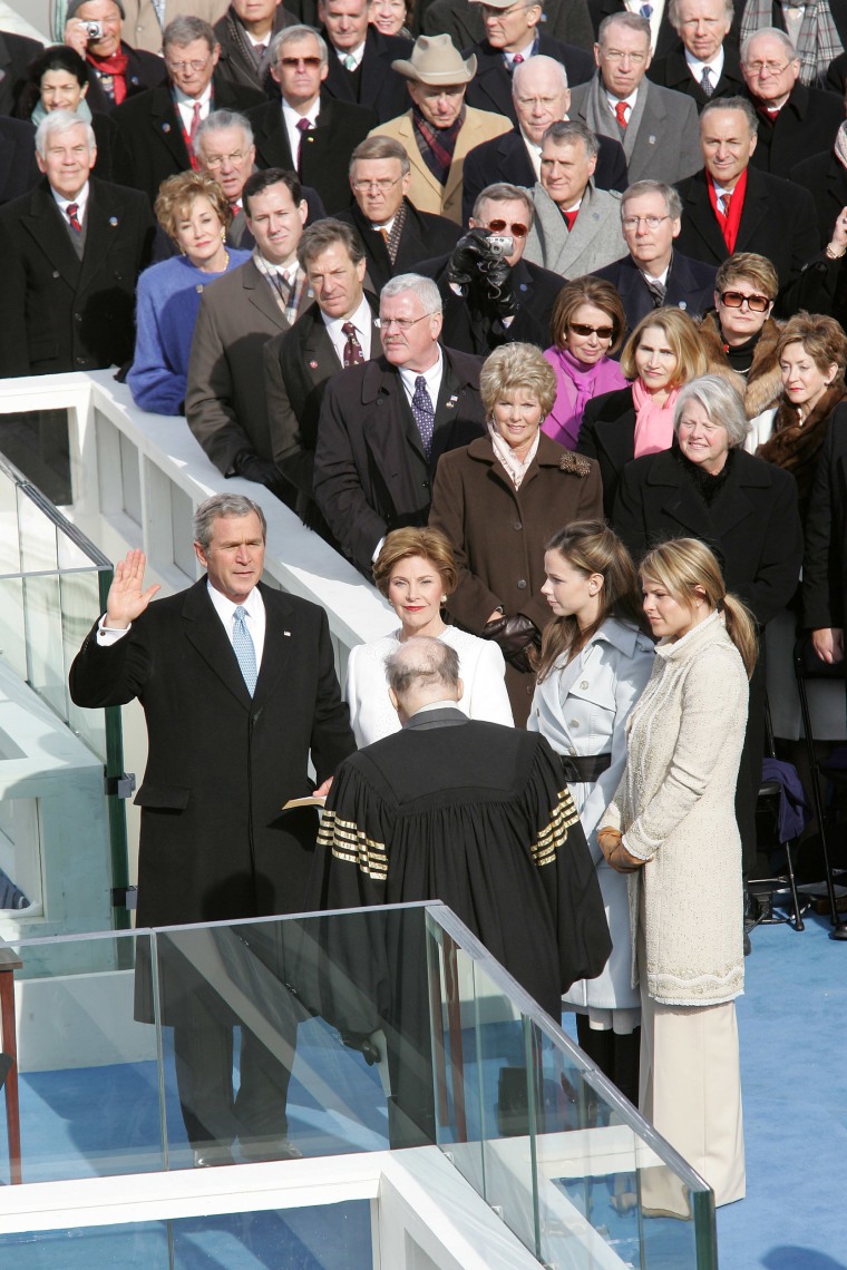 President George W. Bush takes the oath of office from Supreme Court Justice William Rehnquist during inauguration ceremonies on Capitol Hill in Washington on Jan. 20, 2005.