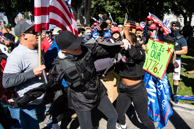 Berlinda is surrounded by a hostile crowd of Trump supporters on Jan. 6, 2021, in Los Angeles.