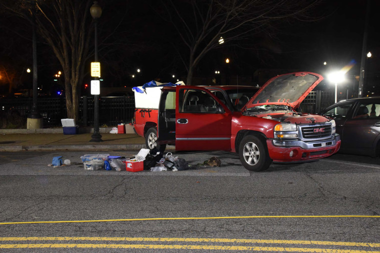 While responding to reports of explosive devices in the area, U.S. Capitol Police officers saw the handle of a firearm on the front right passenger seat of Lonnie Coffman's truck.