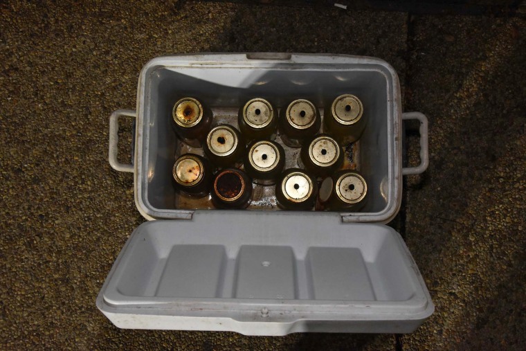 Police determined the jars of liquid found in Lonnie Coffman's truck were Molotov cocktails.