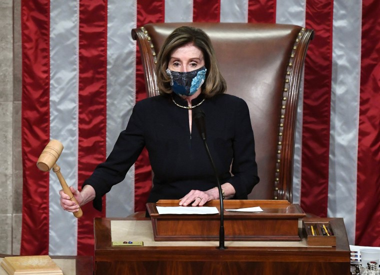 Image: House Speaker Nancy Pelosi gavels in the final vote of President Donald Trump's impeachment at the Capitol