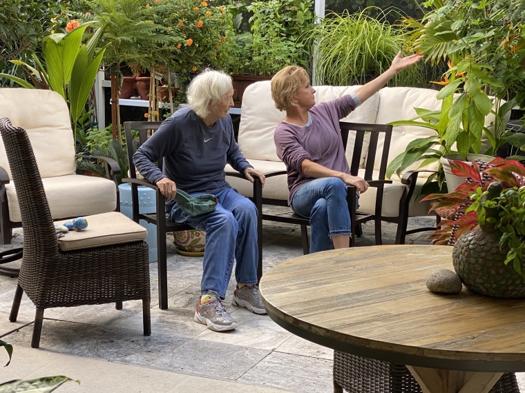 Mika Brzezinski and her mom spending time together outside on the patio in Florida.