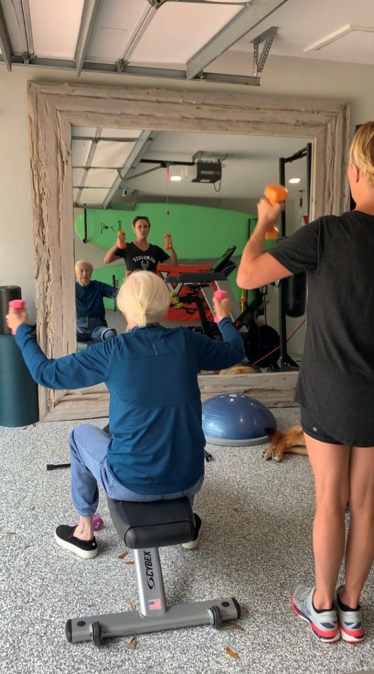 Mika Brzezinski and her mom, Emilie, lifting weights together.