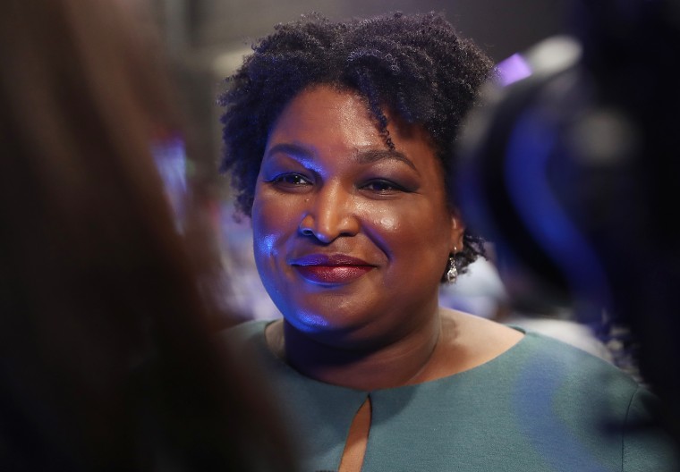 Image: Stacey Abrams speaks to reporters in Atlanta