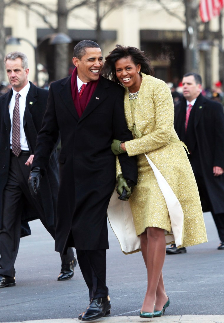 US President Barack Obama and First Lady Michelle walk the Inaugural Parade route after Obama was sworn in as 44th US president.