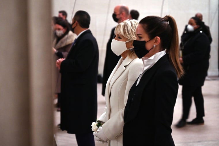 US First Lady Jill Biden and daughter Ashley look on as the US president speaks during the "Celebrating America" inaugural program at the Lincoln Memorial in Washington, DC.