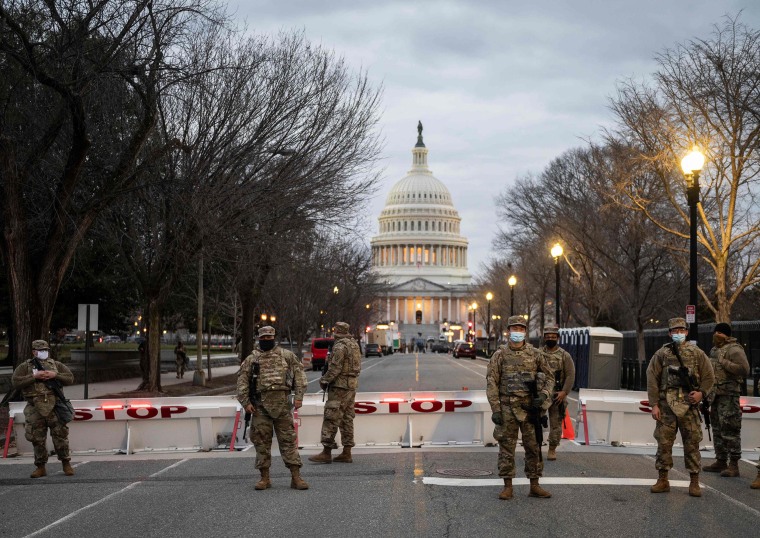 Image: Members of the National Guard stand watch at the U.S. Capitol
