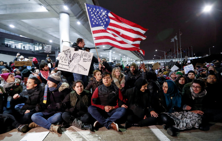 Image: People gather to protest against the travel ban imposed by U.S. President Donald Trump's executive order, at O'Hare airport