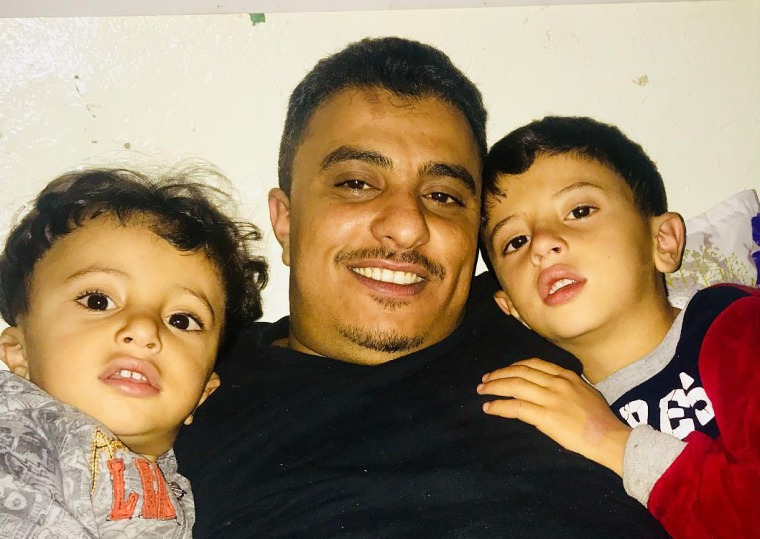Hussein Saleh and his two sons.