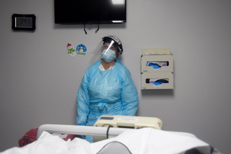 Image: Healthcare workers treat COVID-19 patients in Houston