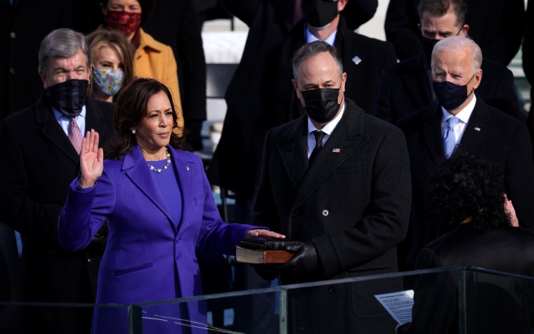Image: Kamala Harris is sworn in as Vice President as her husband, Doug Emhoff, looks on at the Capitol on Jan. 20, 2021.