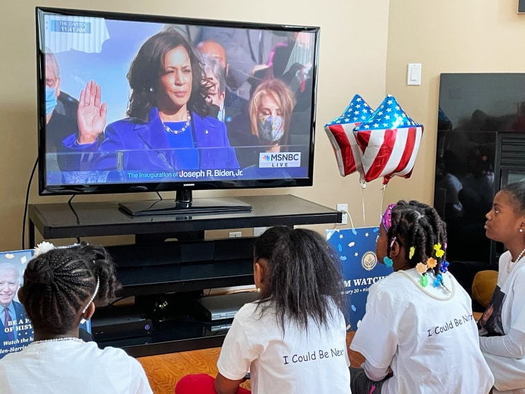 Alison Vaughn's daughter and her friends in West Bloomfield, Michigan, watch the swearing in of Vice President Kamala Harris on Jan. 20, 2021.