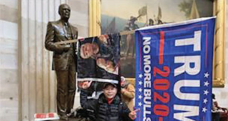 IMAGE: Houston police Officer Tam Dinh Pham in the Capitol on Jan. 6