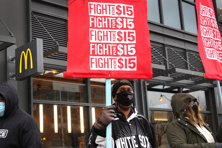 Image: Demonstrators participate in a  protest outside of McDonald's corporate headquarters