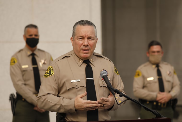 Los Angeles County Sheriff Alex Villanueva addresses a press conference on the steps of the Hall of Justice in downtown Los Angeles providing more details of the arrest of more than 150 people at a Super-spreader event in Palmdale.