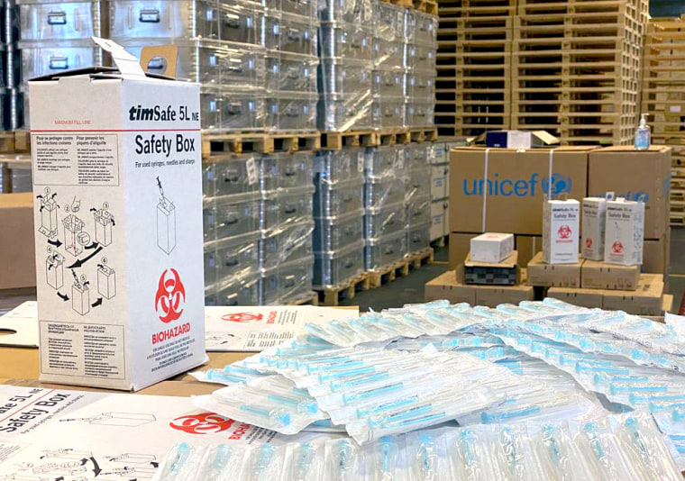 Auto-disable syringes and safety boxes that are being used in the Covid-19 response at UNICEF's warehouse in Copenhagen, Denmark on Dec. 7, 2020.