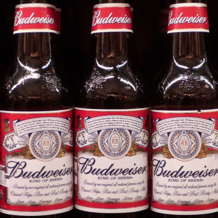Bottles of Anheuser-Busch's Budweiser beer sit on display in