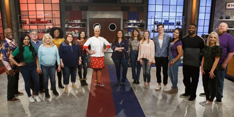 Ariel Robinson (fifth from left, in yellow top), the winner of Season 20 of Food Network's "Worst Cooks in America," has been charged in the death of a 3-year-old girl she and her husband had adopted. 