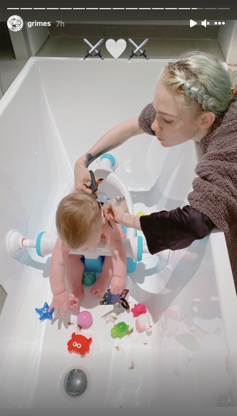 Grimes shared a photo of herself cutting her son's hair in her Instagram Story.