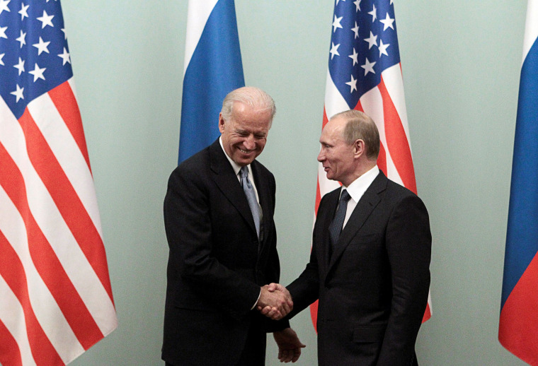 Image: Vladimir Putin and Joe Biden in 2011