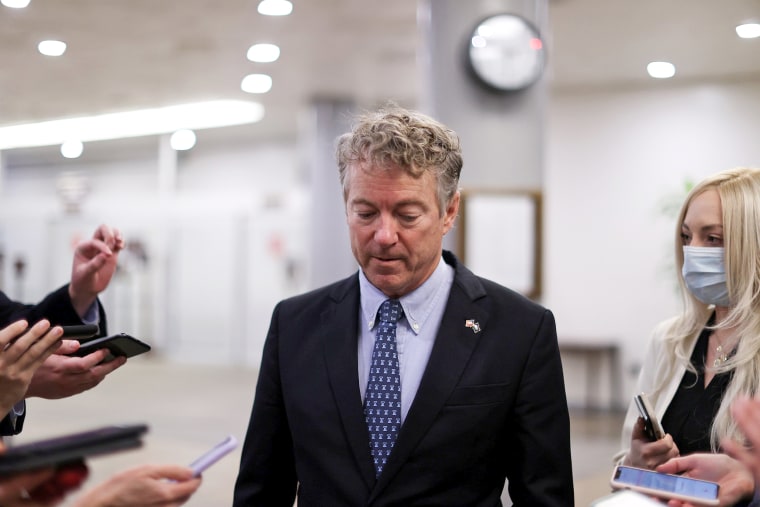 Image: U.S. Senator Paul is trailed by reporters as he arrives to be sworn in for the impeachment trial of former president Trump in the U.S. Capitol in Washington