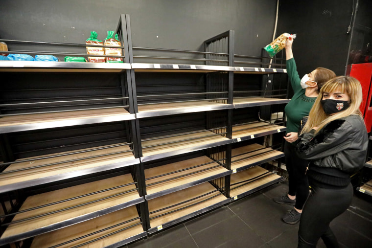 Image: A nearly empty bread section at a supermarket in Beirut, Lebanon, days ahead of a national Covid-19 lockdown,